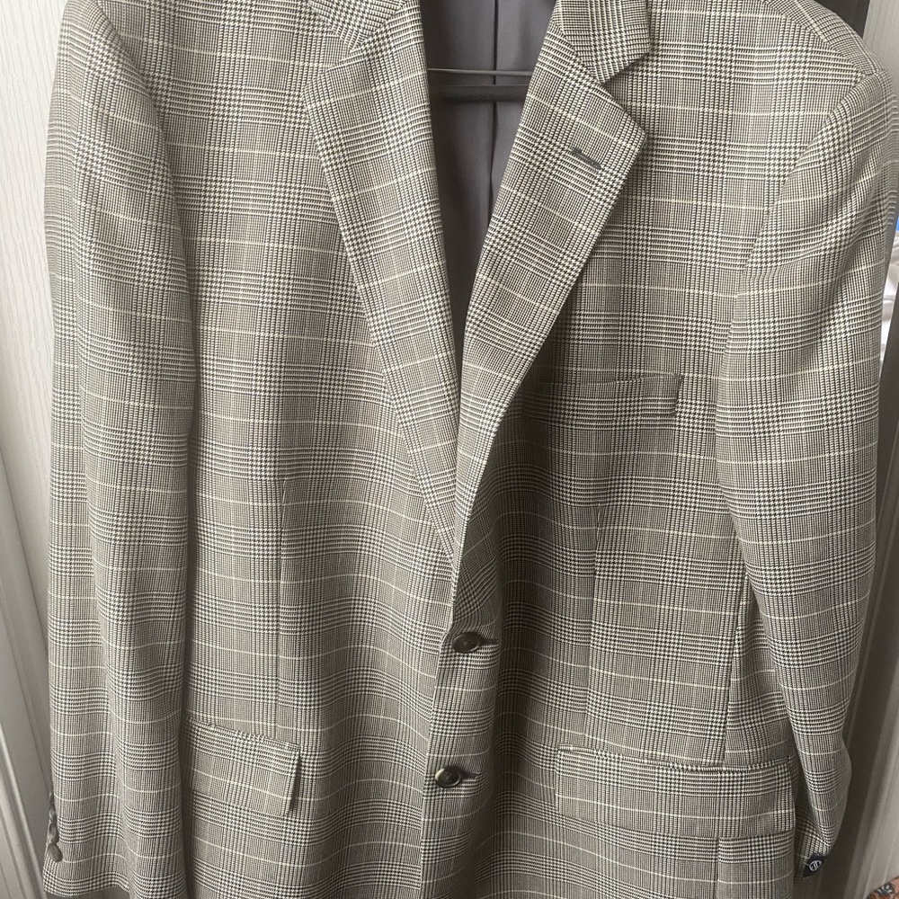Men’s single breasted suit jacket by Stafford. Grey and White pin stripped.
